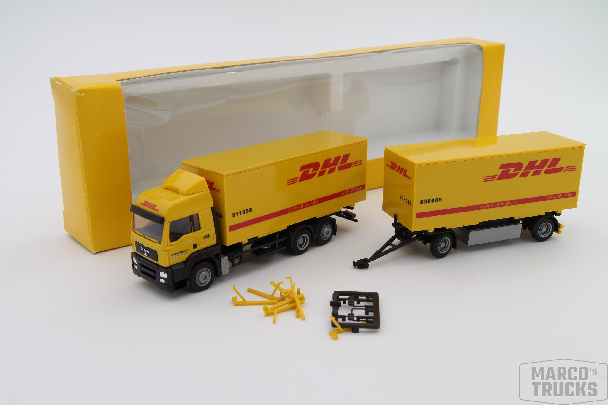 AWM MAN TG-A LX DHL + Semi-remorque Tôlée 3 Essieux – Échelle HO 1/87 – Occasion