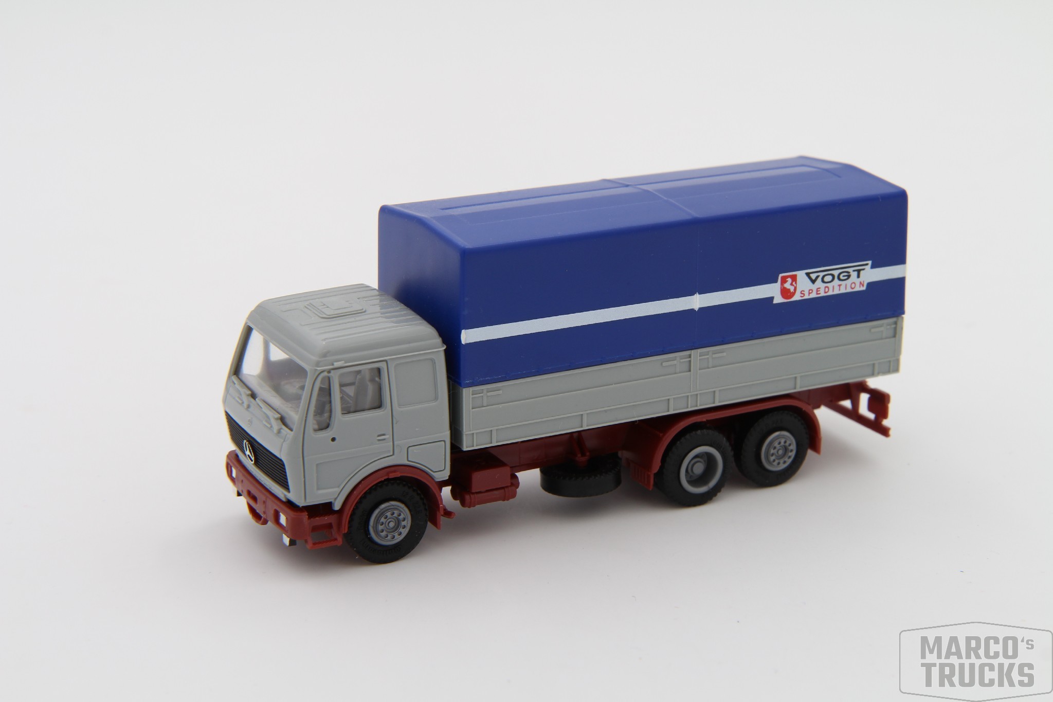 Herpa MB Mercedes NG Motorwagen 3achs Pritsche/Plane „Vogt Spedition“ / H14694
