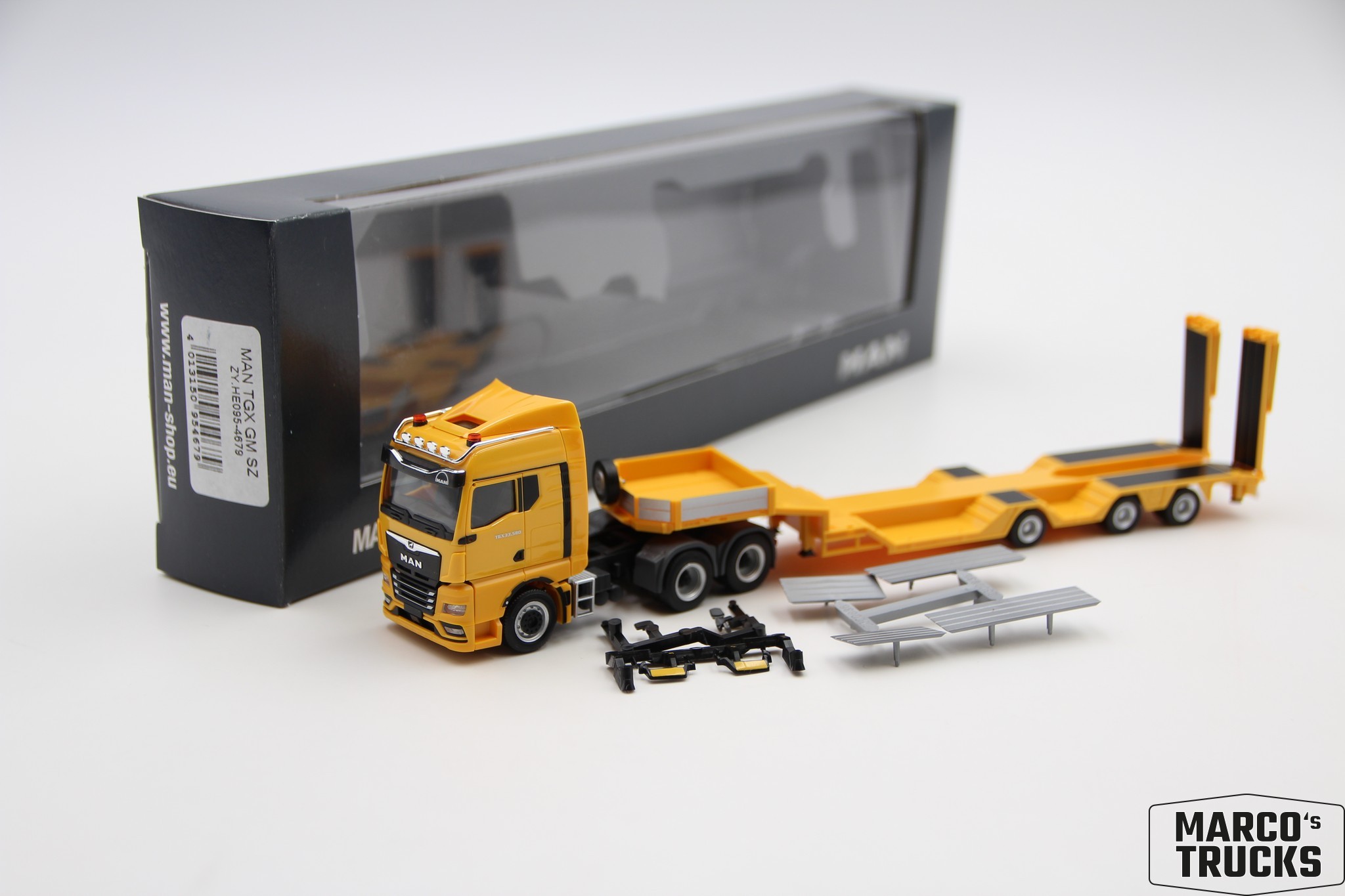 Herpa MAN TGX GM 33.580 Goldhofer-Sattelzug yellow No. 954679 1:87